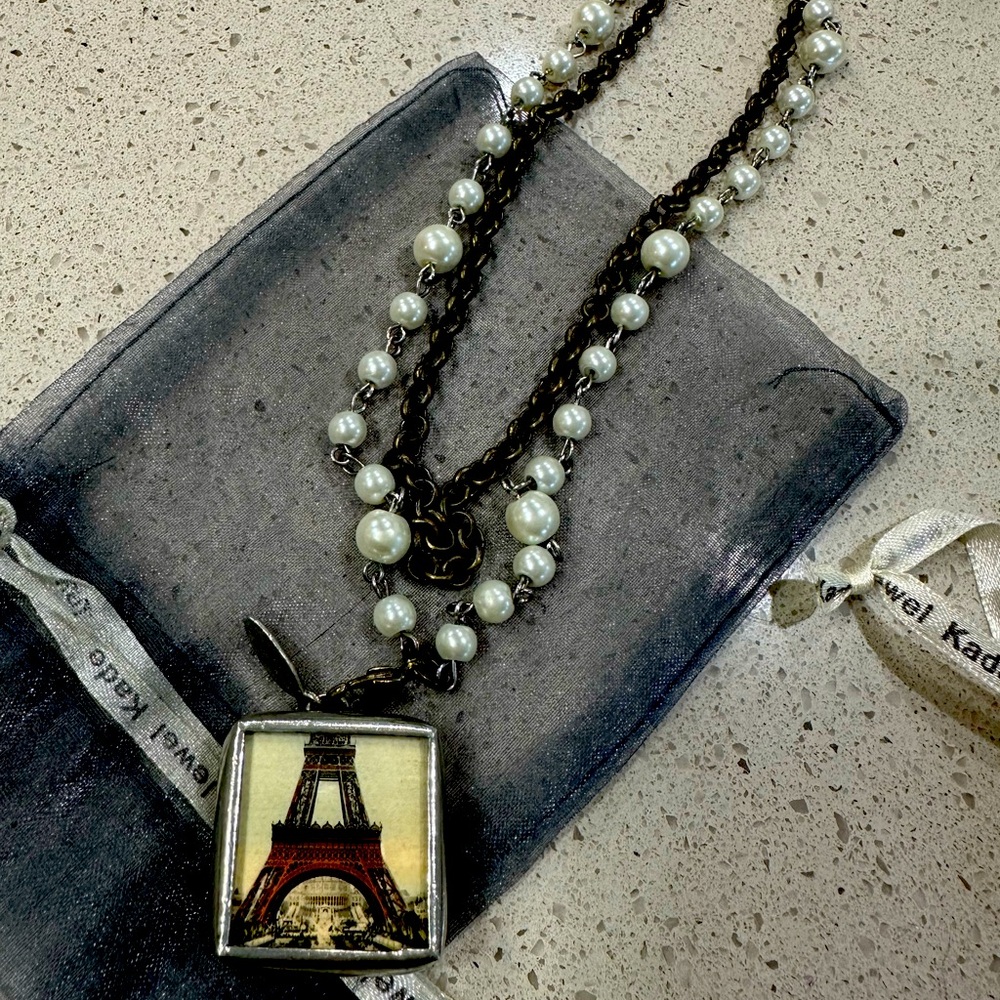 Double necklace with Parisian pendant.
